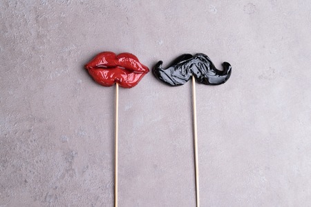 fake red lips and man beard sweet icicles, man and woman concept, love 14th february, Valentine day, weedingの写真素材