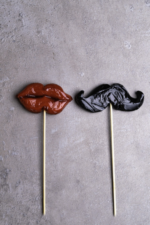 fake red lips and man beard sweet icicles, man and woman concept, love 14th february, Valentine day, weedingの写真素材