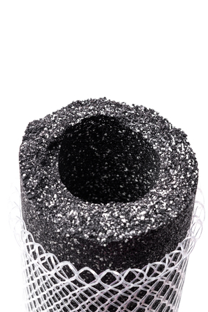 Carbon pellets of water filters in a cutの写真素材