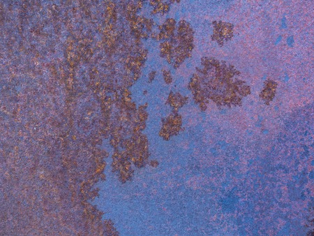 Old blue painted wall with rust texture. Grunge rusted metal background. Rust stains.の写真素材