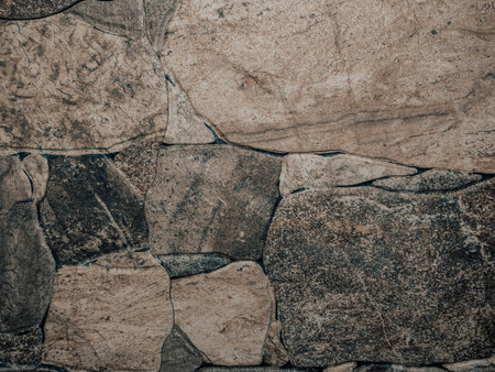 Old castle stone wall texture background. Stone wall as a background or texture. Part of a stone wallの写真素材
