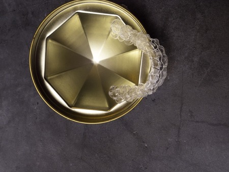 teeth braces or invisible retainer, orthodontic equipment with copy spaceの写真素材