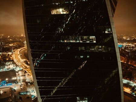 Moscow, Russia, December, 2018 multi-storey office building at night, working overtime. late night...