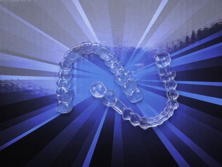 Inivisalign braces or aligner. A way to have a beautiful smile and white teeth, copy space