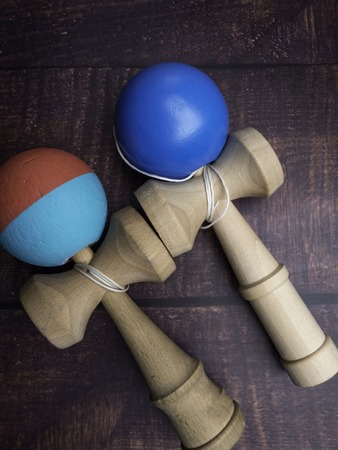 The original Kendama. Traditional, wooden Japanese skill toy for children. cups, spike and ball, selective focusの写真素材