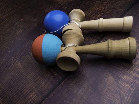 two Kendama japanese toys, competition sport concept, used and new kendama toys, copy spaceの写真素材