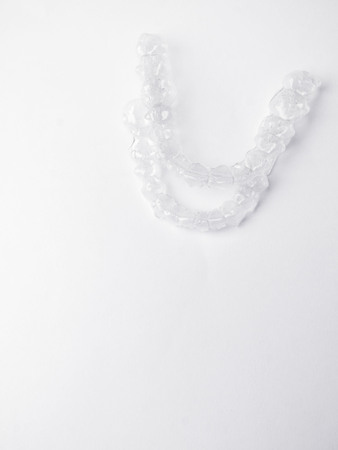 Inivisible braces, aligner isolated on white backgroundの写真素材