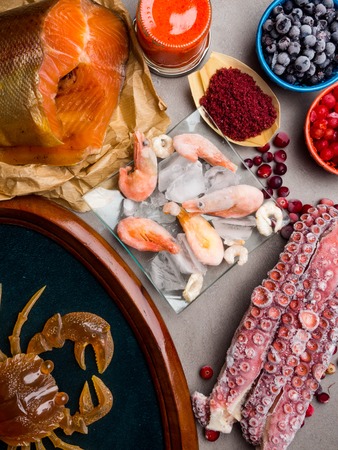 Foods High in astaxanthin, as shrimps, red fish, crab, salmon, blueberry, cranberry, red seaweed, caviar, walmars tentacles, iodine, antioxidantsの写真素材