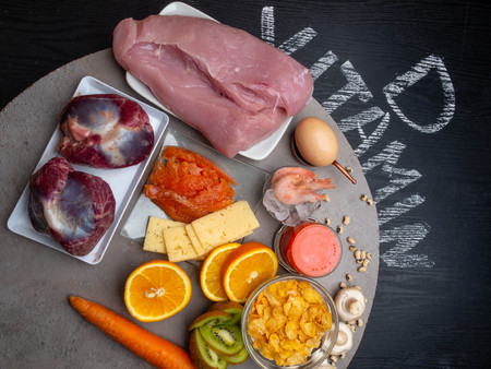 Natural sources of vitamin D and Calcium. Healthy food background. Top view. Inscriptionの写真素材