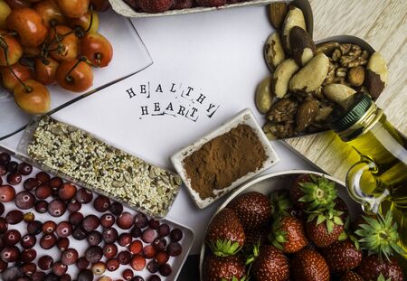 Super food to slow the ageing process concept including High in antioxidants, anthocyanins, dietary fibre & vitamins, healthy food food with inscriptionの写真素材