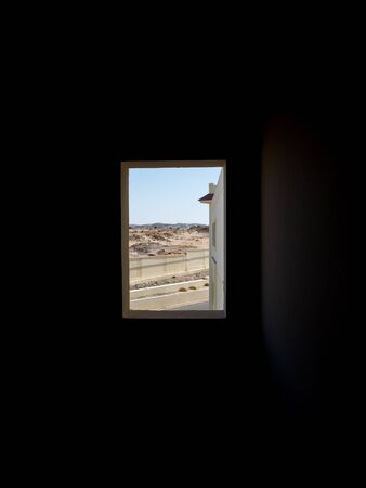 View from window on Desert, Egypt, with an idyllic view sandy mountains and blue skyの写真素材