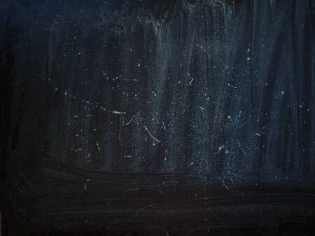 Chalk rubbed out on blackboardの写真素材