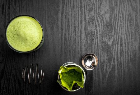 Matcha green tea latte in a cup. Top view. Copy space.の写真素材