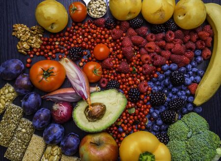 Healthy balanced dieting concept. Selection of rich fiber sources vegan food. Vegetables fruit seeds...
