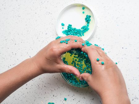The child playing slime in happy timeの写真素材