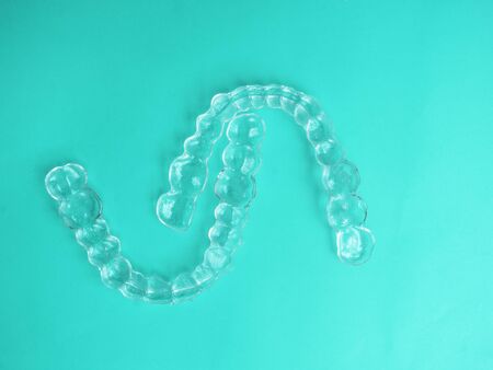 Invisible dental aligners modern tooth brackets transparent braces to straighten teeth in cosmetic...