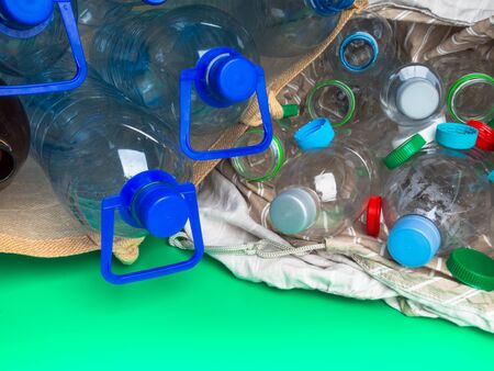 Transparent plastic bottles recycling in eco bag, recycle concept