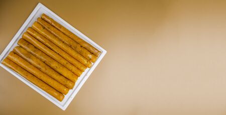 Delicious healthy fruit roll-ups made from pumpkin, mandarines, plum, persimmon, healthy sweet snack conceptの写真素材