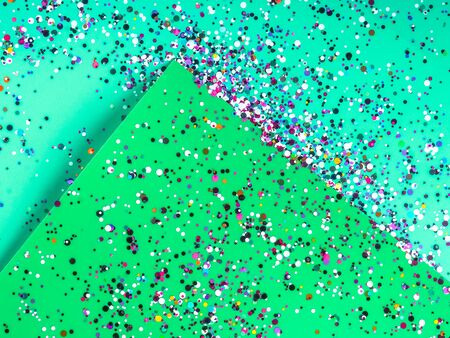 Paper sheets in mixed green colors. Abstract geometric trendy background. Color of the year 2020....