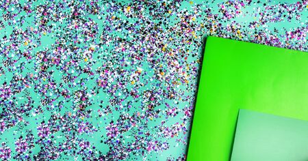 Paper sheets in mixed green colors. Abstract geometric trendy background. Color of the year 2020....