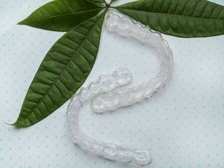 orthodontic clear aligner to straighten teeth, Clear plastic invisible teeth aligners with green...