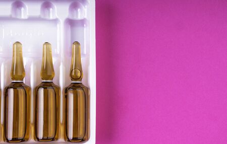 medical Transparent capsules ampoules from brown medical glass, Medicine, vactination, Injection, drug concept. Close upの写真素材