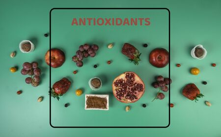 food rich with resveratrol, polyphenols, fruits, berries, nuts, chocolate or cacoa, foods rich in antioxidants, helps to boosting immune system, top view, flat layの写真素材