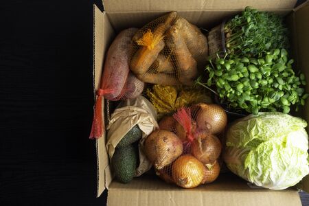 grocery packaging reusable paper shopping eco box with healthy food, clean eating selection. Eco-friendly, Plastic free Zero waste lifestyle, copy space, selective focusの写真素材