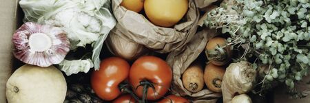 Grocery banner with healthy food clean eating selection as vegetables, green leaf. Food rich in fiber, vitamin, antioxidants, close up, selective focus, creative tonedの写真素材