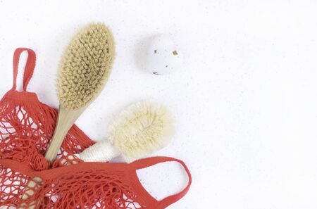Eco-friendly natural bath brushes, handmade soap in natural organic bag, lifestyle, zero waste concept. Copy spaceの写真素材