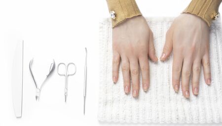 Beautiful Woman Hands On White Spa Towel. Set Of Professional Manicure Tools. Beauty Careの写真素材