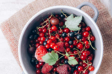Assorted of fresh ripe berries in bowl. Selectve focus close upの写真素材