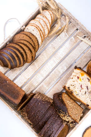 assortment of fresh baked bread, still life, traditional bread and wheatの写真素材