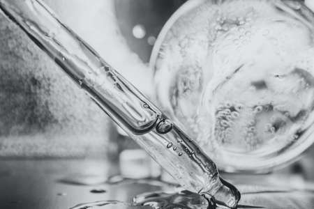 Liquid gel or hyaluron acid cosmetic toned in ultimate gray colorの写真素材