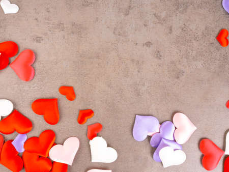 frame of colorful party silk festive confetti heart shapes, Valentine's Day, Mother's Day or Women's Day decoration, love conceptsの写真素材