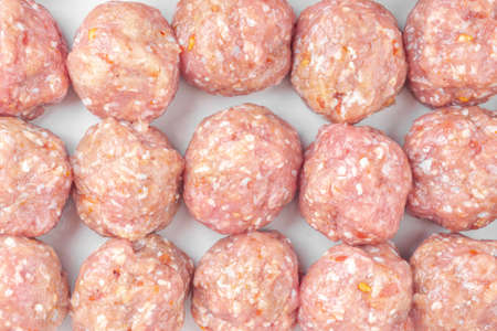 homemade raw organic mincet meat balls, uncooked, isolated on white, close up. Chinese food. Macroの写真素材