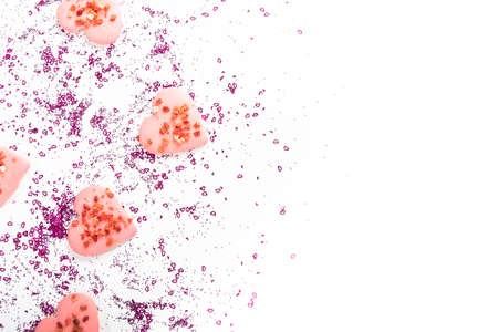 Valentine heart cookies dry strawberries on white background with confetti, Greeting cardの写真素材