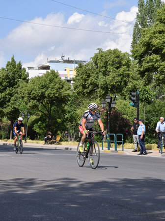TIRANE, ALBANIA - May 29 2022. Cyclists racing on city road. Competition TIRANATHLONEのeditorial素材