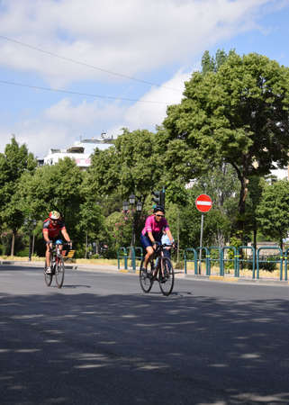 TIRANE, ALBANIA - May 29 2022. Cyclists racing on city road. Competition TIRANATHLONEのeditorial素材