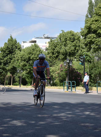 TIRANE, ALBANIA - May 29 2022. Cyclists racing on city road. Competition TIRANATHLONEのeditorial素材