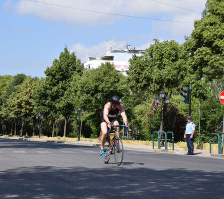 TIRANE, ALBANIA - May 29 2022. Cyclists racing on city road. Competition TIRANATHLONEのeditorial素材