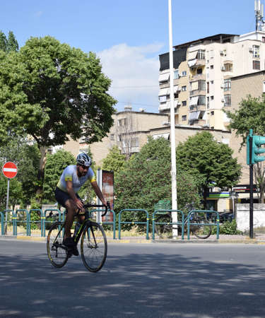 TIRANE, ALBANIA - May 29 2022. Cyclists racing on city road. Competition TIRANATHLONEのeditorial素材