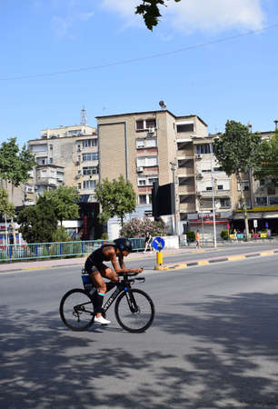 TIRANE, ALBANIA - May 29 2022. Cyclists racing on city road. Competition TIRANATHLONEのeditorial素材