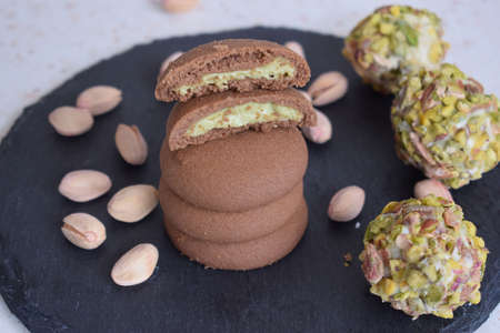 Delicious cookies with chocolate and pistachioの写真素材