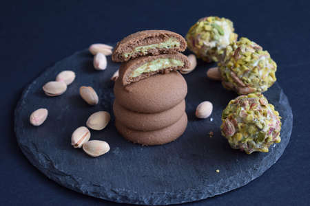 Delicious cookies with chocolate and pistachioの写真素材