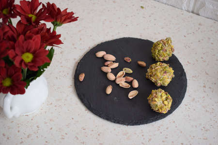 Very tasty cake with chocolate and pistachio.の写真素材