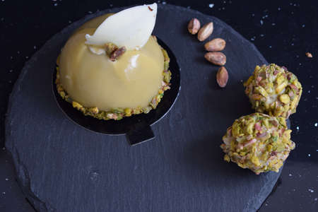 Very tasty cake with chocolate and pistachio.の写真素材