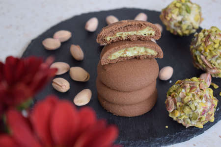 Delicious cookies with chocolate and pistachioの写真素材