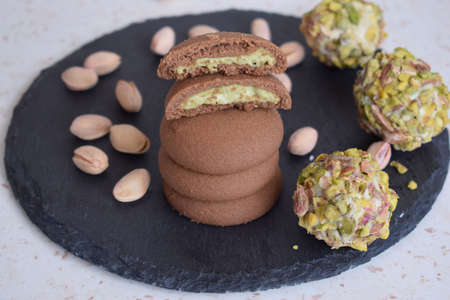 Delicious cookies with chocolate and pistachioの写真素材