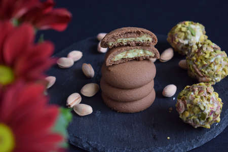 Delicious cookies with chocolate and pistachioの写真素材